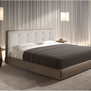 Bed van bruine stof en bruin ecoleer Bed van bruine stof en bruin ecoleer