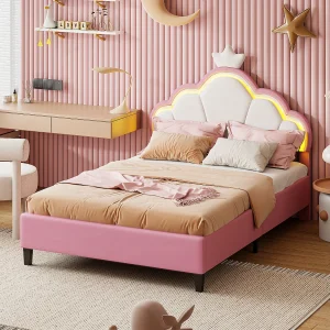Bed van 90×200 cm in roze en wit fluweel met ledverlichting, kroondesign, afstandsbediening en aanpasbare standen. Bed van 90×200 cm in roze en wit fluweel met ledverlichting, kroondesign, afstandsbediening en aanpasbare standen.