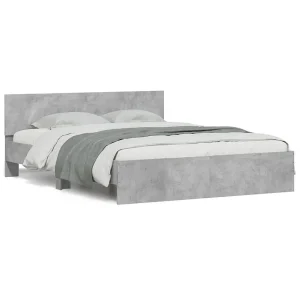 Bedframe met hoofdeinde betongrijs 140×190 cm